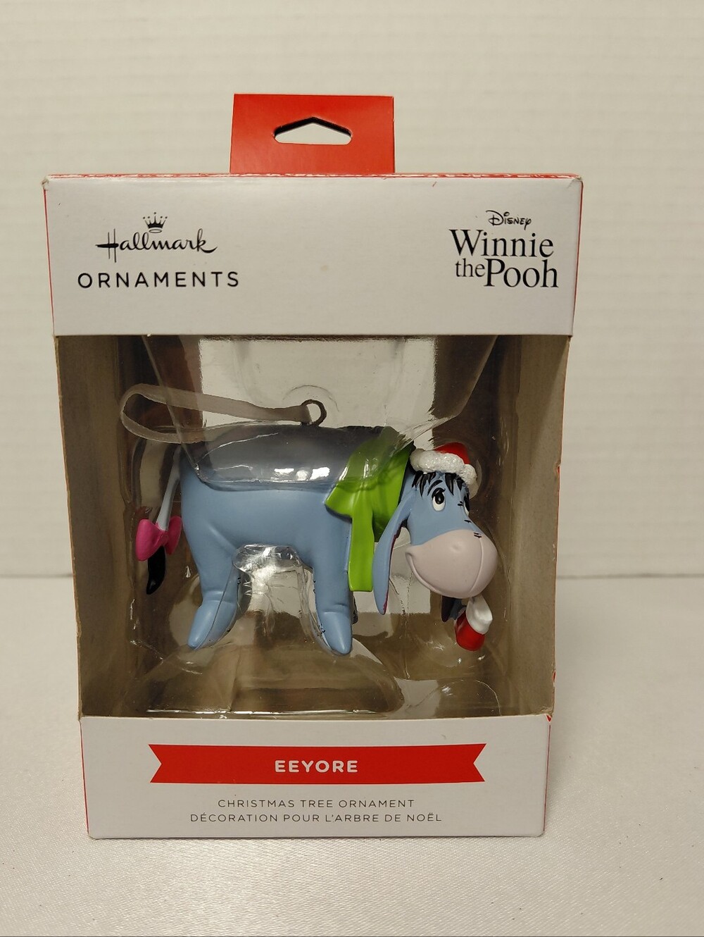 Hallmark Eeyore Ornament in Light Blue with Green Bow and Red Hat
